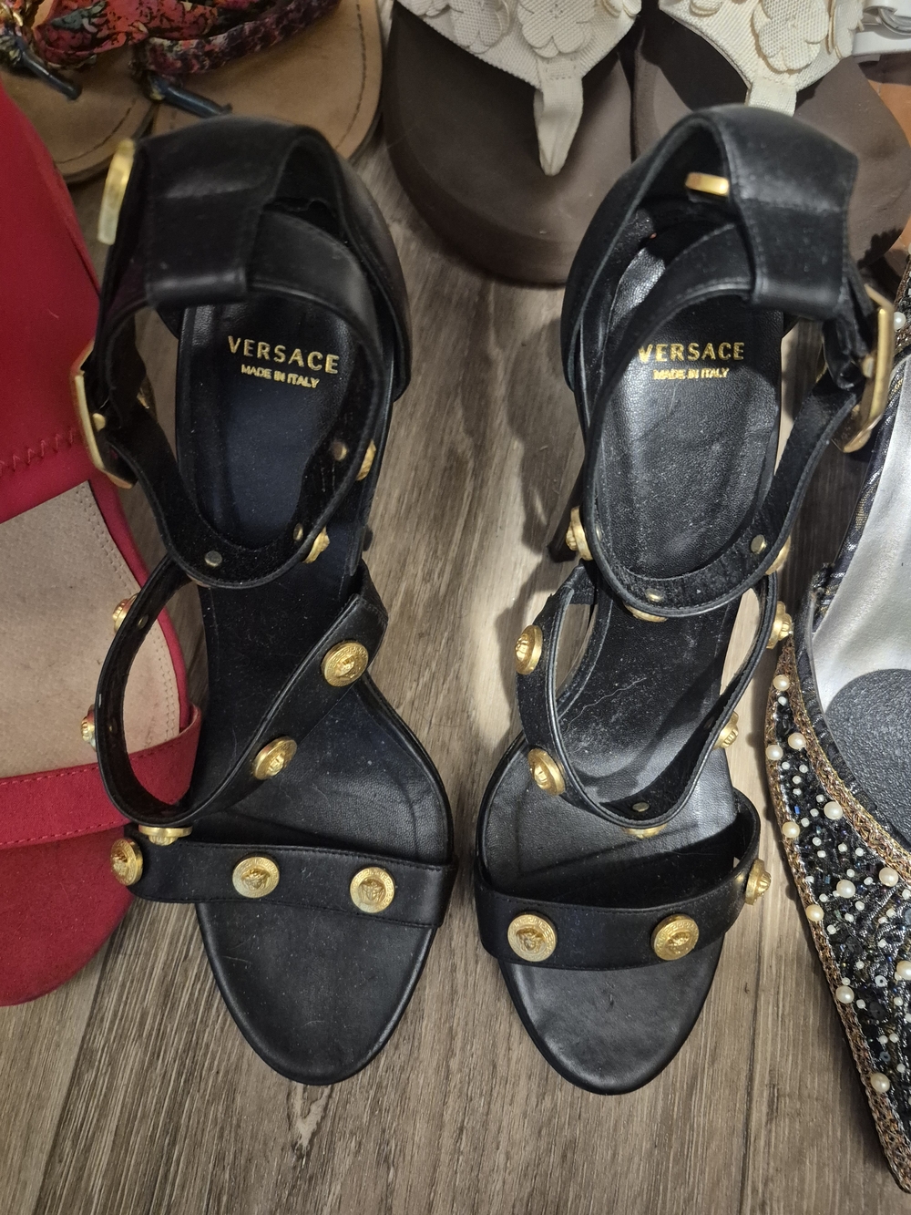 Versace Black Leather Gold-Stud Ankle Strap Sandals.